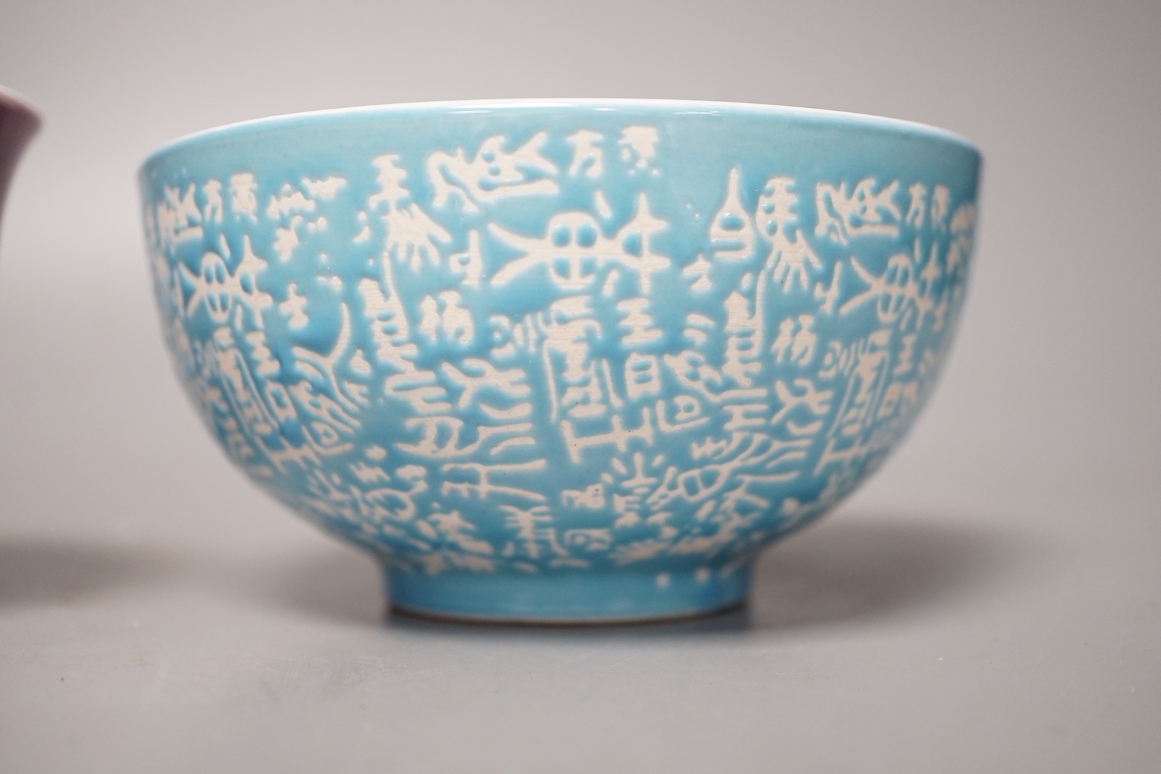 A Chinese copper red glazed bowl and two others